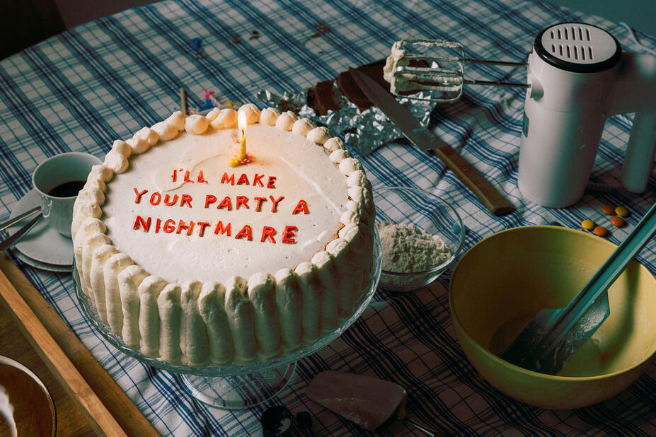 A cake that says "I'll make your party a nightmare."